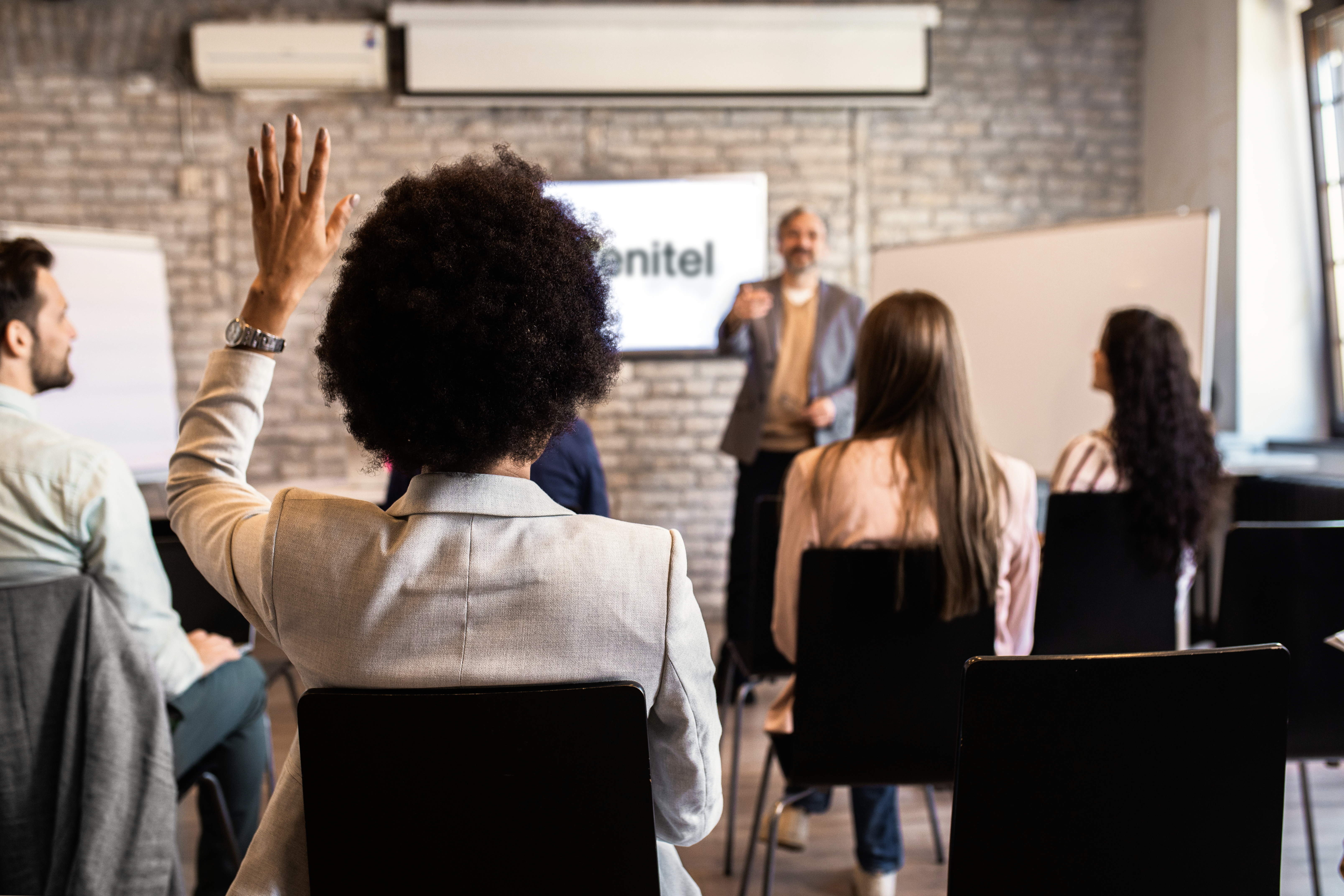 classroom at Zenitel full of people shadowing experienced individuals 