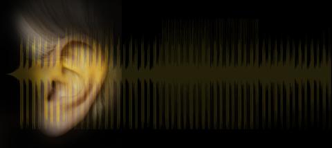 an ear and audio waves